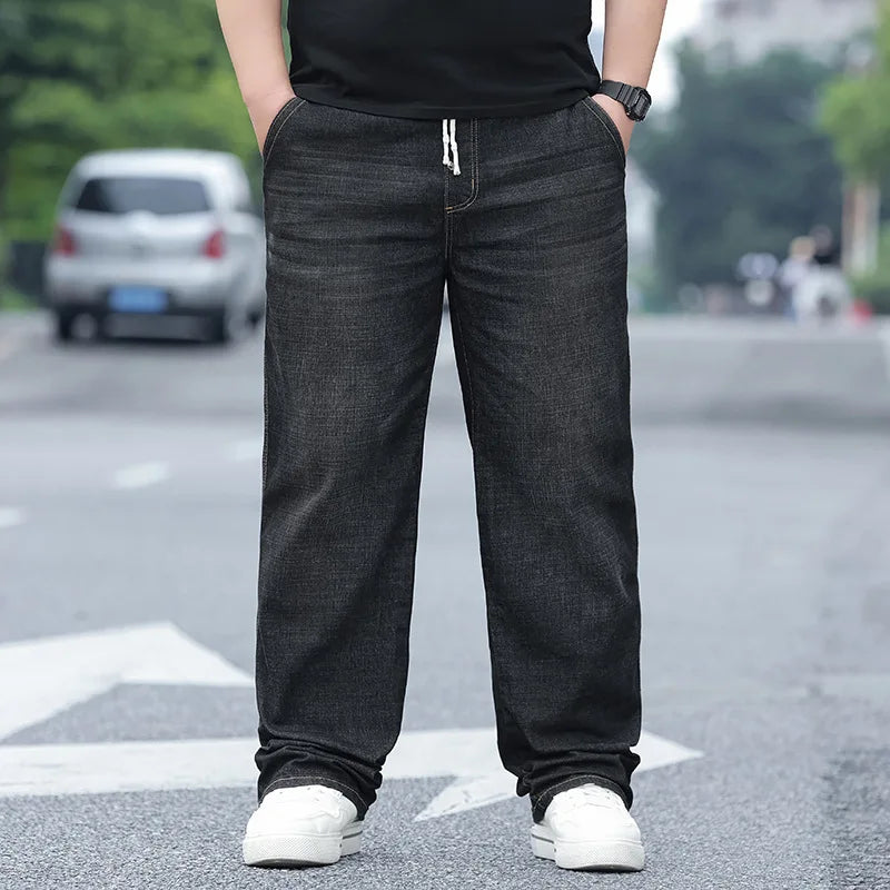8XL Oversize Jeans Men Autumn Fashion Streetwear Pant Plus Size Cargo Jeans Soft Cotton Loose Baggy Casual Jeans For Dad Husband